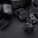 Charcoal on black floor High angle view